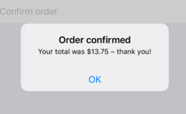 An iOS alert showing the order was confirmed.