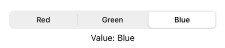 A grey capsule containing the choices Red, Green, and Blue, with Blue selected. Below are the words “Value: Blue”.